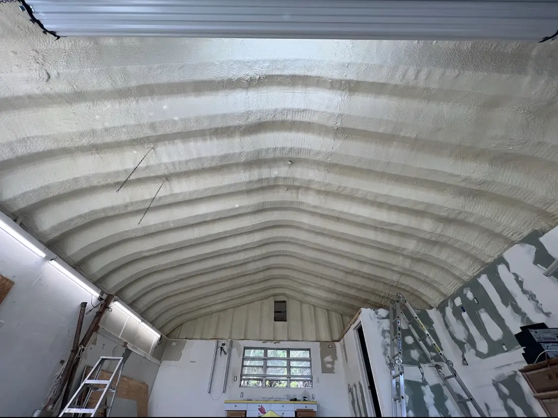 Spray polyurethane foam applied to the underside of a metal roof deck in Colebrookdale